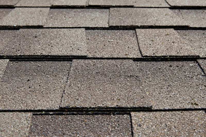 Close view of architectural shingle courses on a tract roof